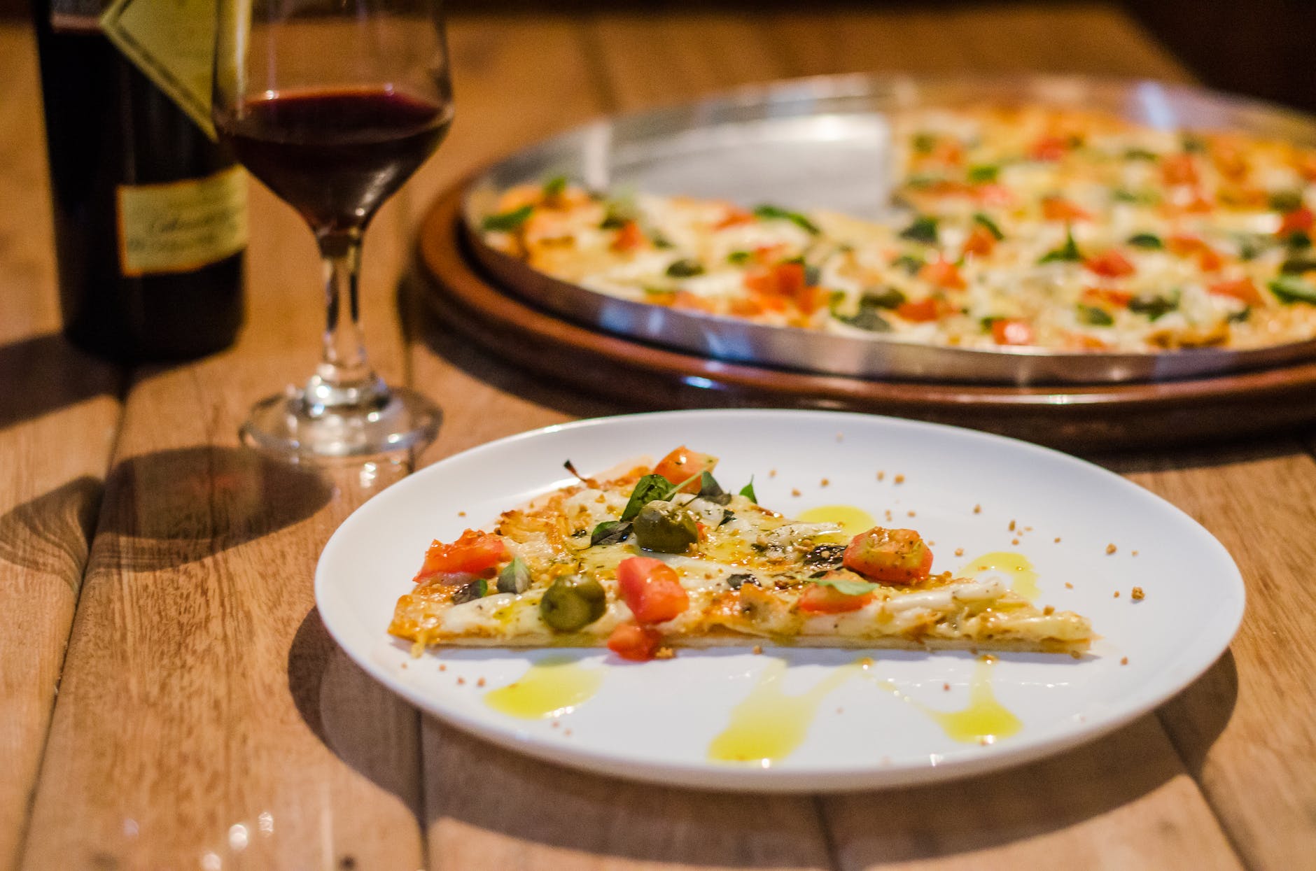 Pairing Wine with Pizza, Pizza on a Tray with a Glass of Wine