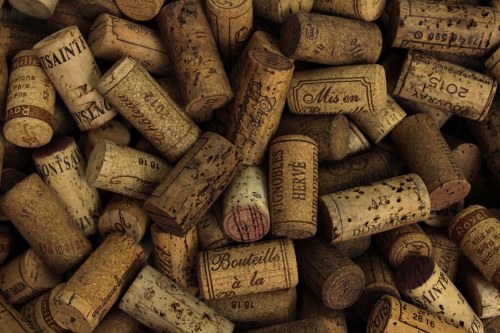 Wine corks piled on top of one another.