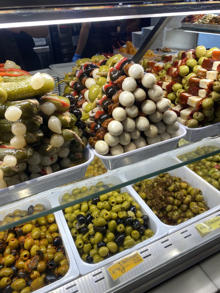 Stacks of olives and skewers.